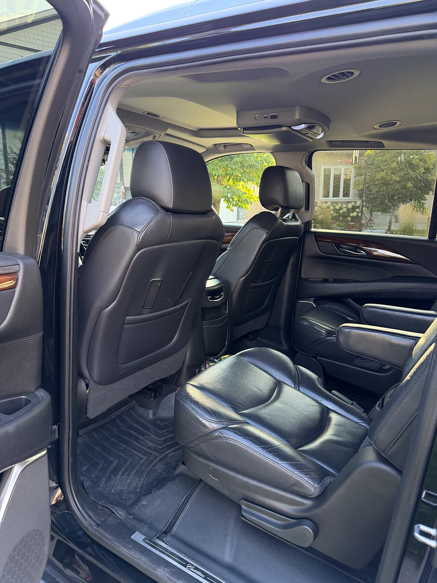 Second-row captain's chairs in the Escalade ESV, with the third row behind
