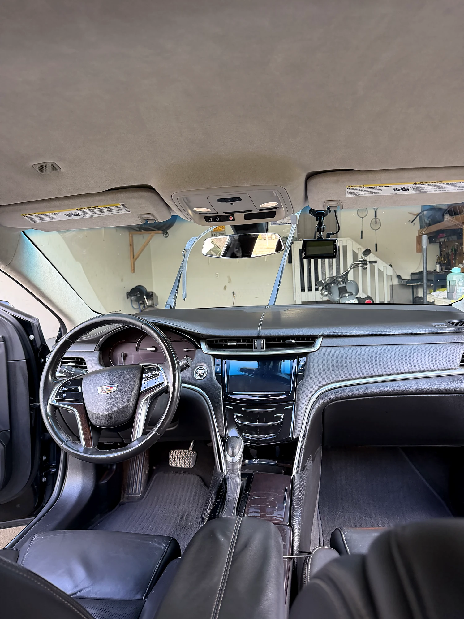 Front cabin of the Cadillac XTS, dashboard and steering wheel